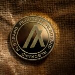 Algorand,Algo,Cryptocurrency,Physical,Coin,Placed,On,Brown,Fabric,And